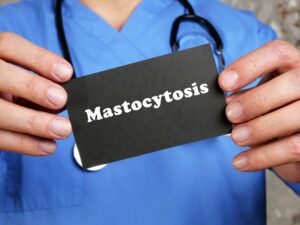 Health care concept about Mastocytosis with inscription on the piece of paper.